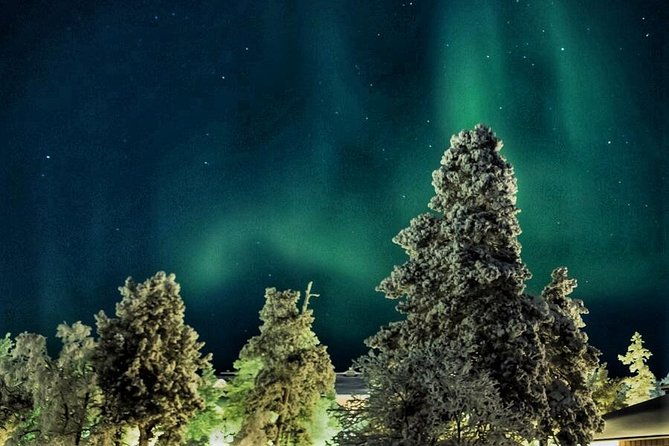 northern-lights-hunting-with-snowmobiles