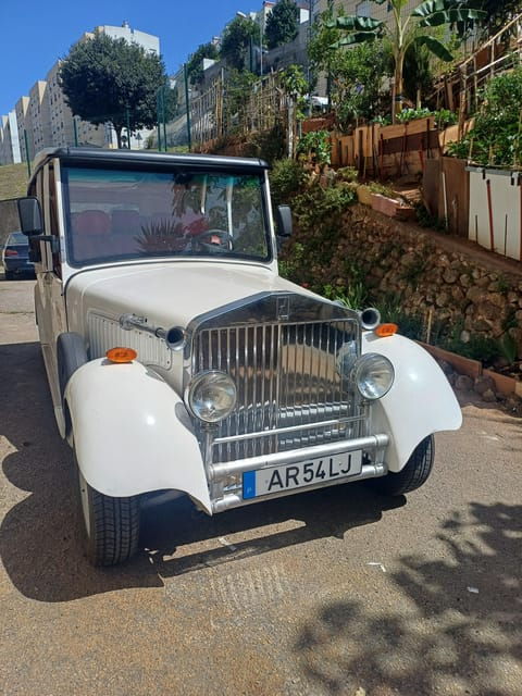 old-town-or-belem-with-the-unique-classic-eco-car-in-lisbon