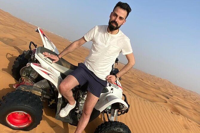One hour Quad Bike at Red Sand Desert Safari with Camel Ride and BBQ Dinner - Authentic Insights from Reviewers