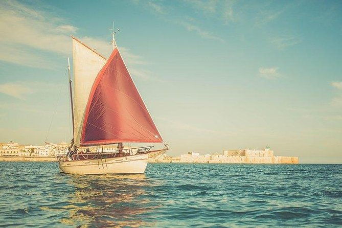 ortigia-and-plemmirio-on-a-sailing-boat