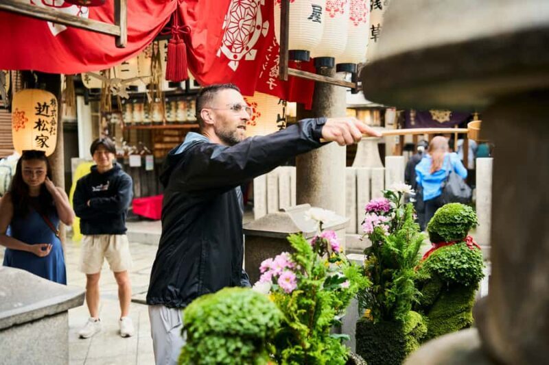 Osaka: 2-Hour Nightlife District Walk & Local Food Culture - Shopping for Kitchenware and Souvenirs