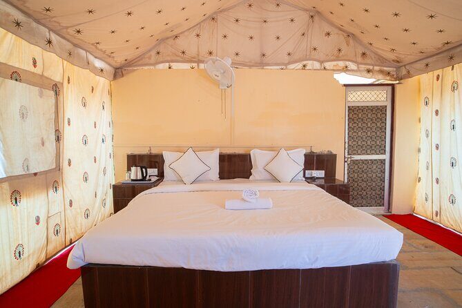 Overnight Stay in a luxury Camp with a cultural show & dinner. - The Sum Up