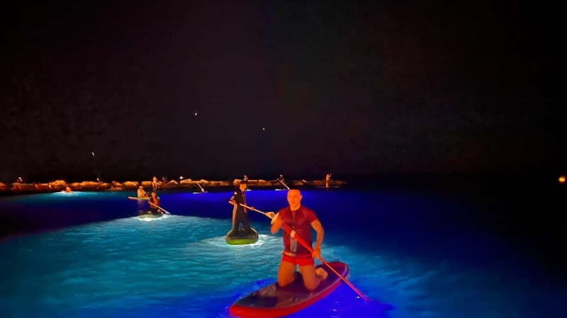 Paddle surf at night with light & drink -photos &videos - Discovering Barcelona from a New Perspective