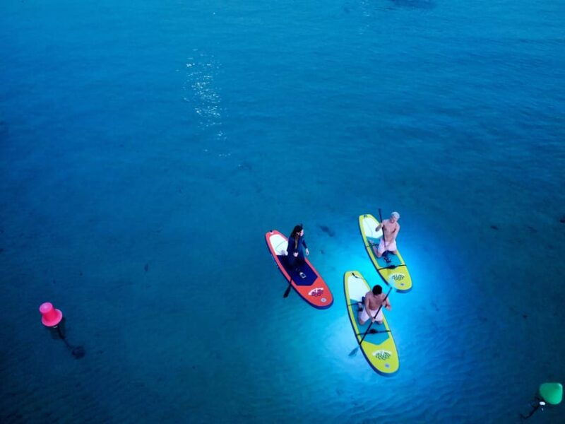 paddle-surf-with-led-lights-at-sunset-in-menorca