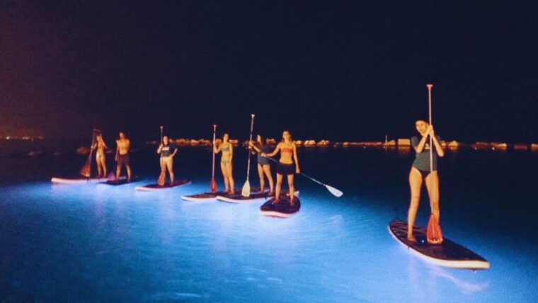 paddle-surf-with-led-lights-at-sunset-in-menorca