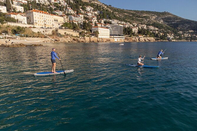 paddleboarding-in-front-of-the-old-town