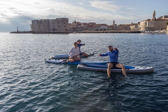 paddleboarding-in-front-of-the-old-town