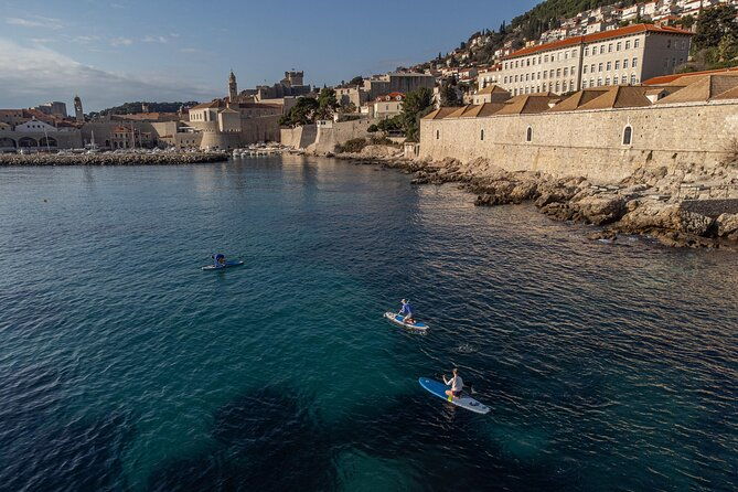 paddleboarding-in-front-of-the-old-town
