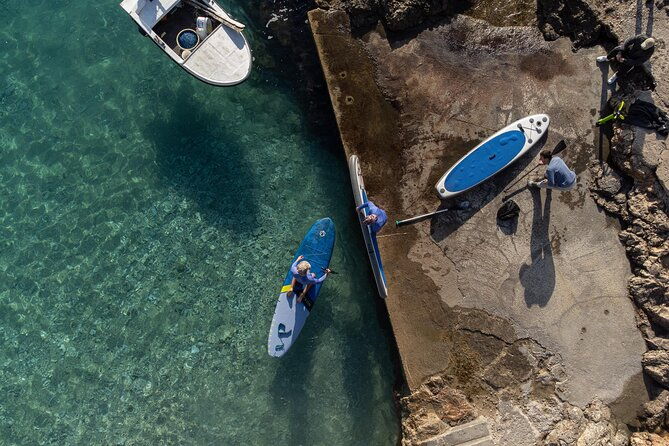 paddleboarding-in-front-of-the-old-town