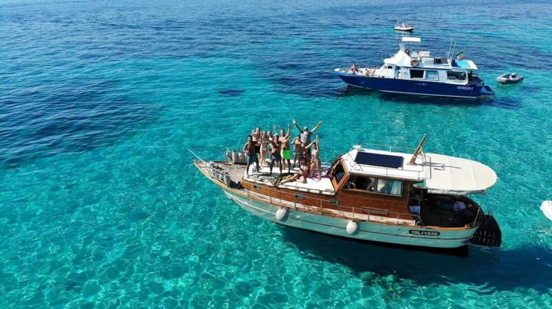 Palau or La Maddalena: wooden boat tour to the archipelago - The Sum Up