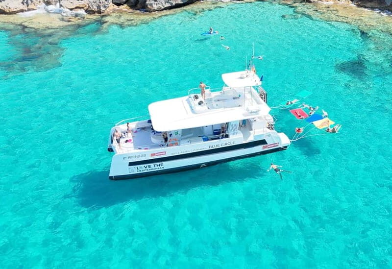 Palma: Deluxe Catamaran with Snacks, Drink, SUP & Snorkeling - Key Points