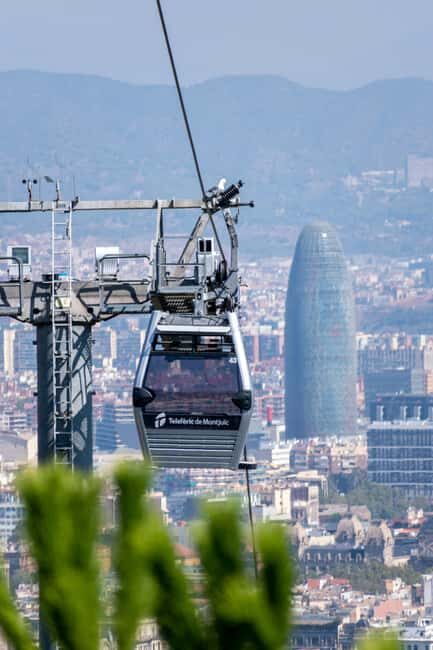 Panoramic Barcelona: Montjuïc, Cable Car, and Beach - An Overview of the Tour Experience
