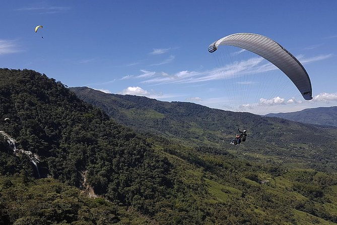paragliding-over-giant-waterfalls-private-tour-optional-guatape-from-medellin