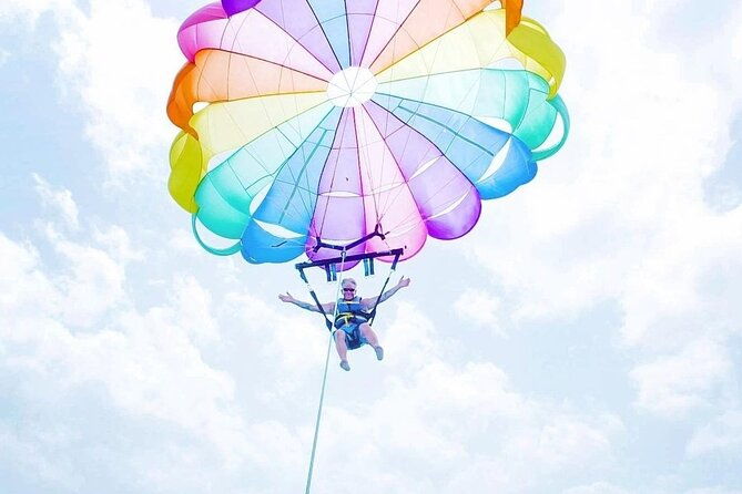 parasailing-blue-hole-mineral-spring-seven-mile-beach