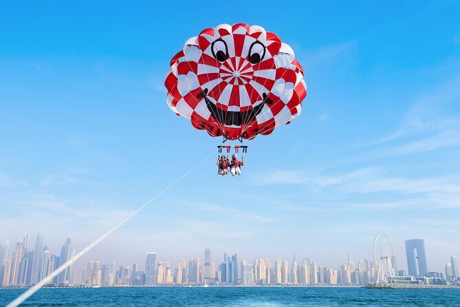 Parasailing in Dubai with Palm Jumeirah and JBR Beach views - Key Points