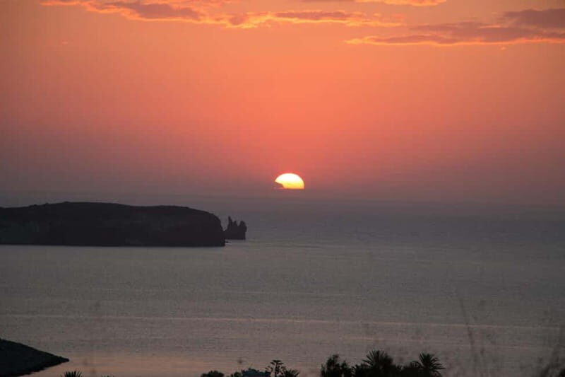 Paros: Sunset Boat Trip with Soft Drinks and Local Wine - The Experience Provider and Booking Details