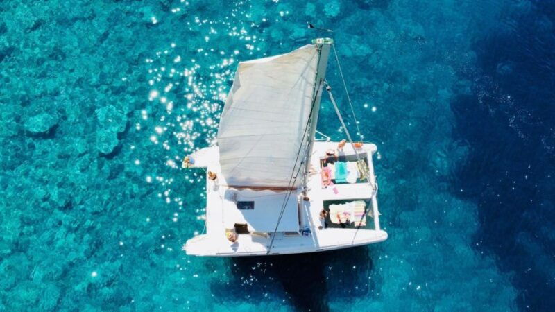 porto-conte-half-day-catamaran-tour-with-aperitif