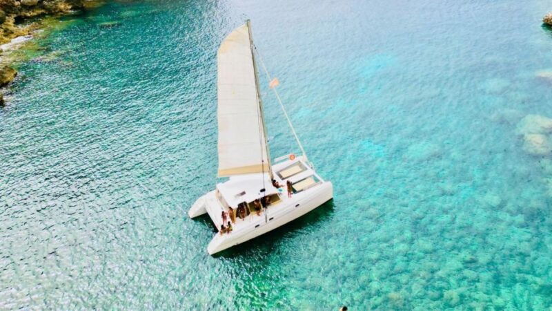porto-conte-sunset-catamaran-excursion-with-aperitif