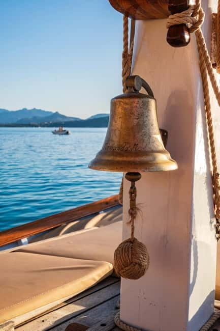 Porto San Paolo: Vintage Cruise Sunset Aperitif to Tavolara - Authenticity and Reviews