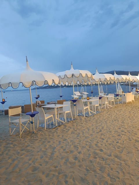 porto-santo-stefano-la-caletta-beach-club-cocktails-under-the-umbrella