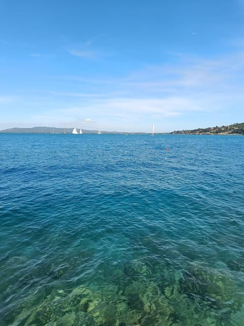 porto-santo-stefano-la-caletta-beach-club-cocktails-under-the-umbrella