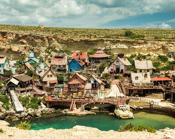private-boat-charter-to-crystal-blue-lagoon-caves-comino