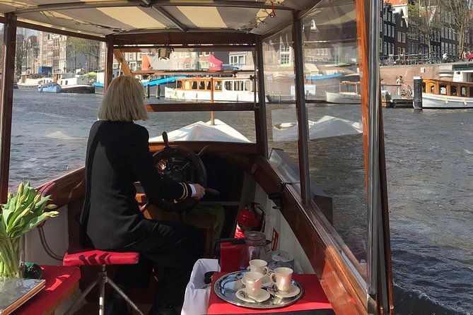 private-canal-cruise-on-small-historic-boat