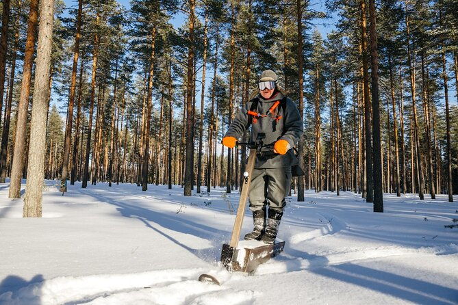 private-driving-snow-scooters-experience-in-finland-2