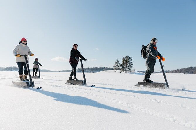 private-driving-snow-scooters-experience-in-finland