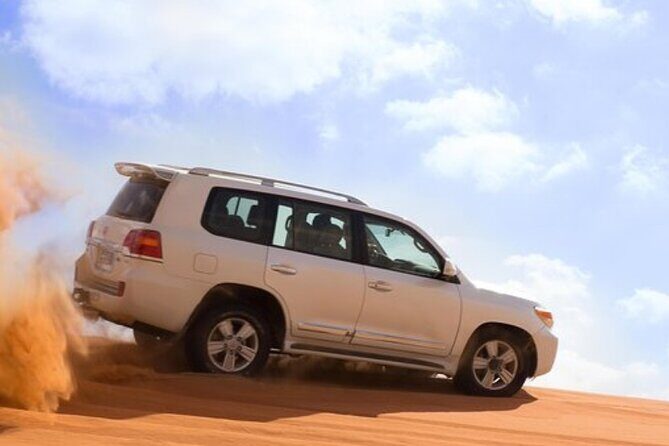 Private Evening Desert Safari with Camel Ride, SandBoard & BBQ - Evening Entertainment & Dinner