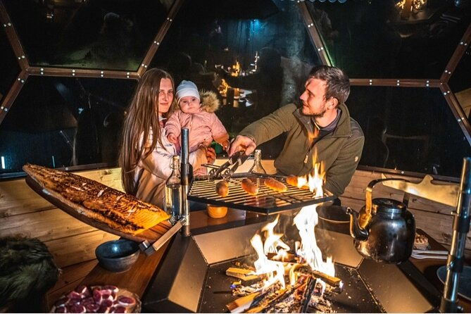 private-glass-igloo-dinner-on-the-shore-of-frozen-lake