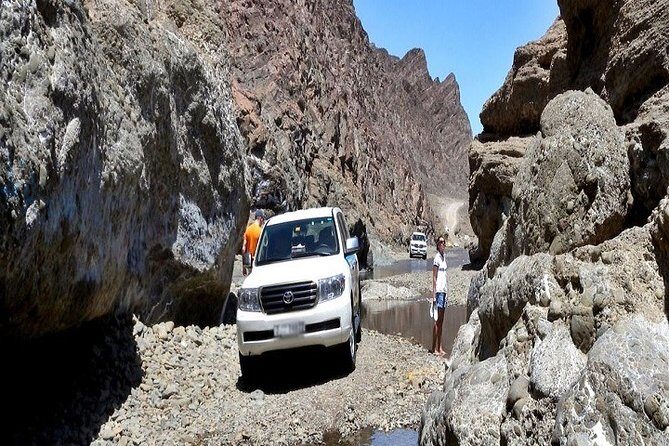 Private Guided Dune Bashing Day Tour in Wadi Hatta Mountains - Key Points