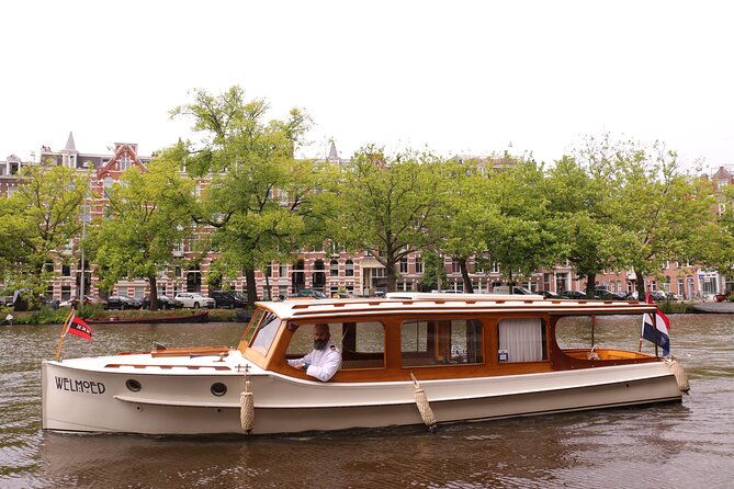 private-guided-historic-amsterdam-canal-cruise-in-a-salon-boat