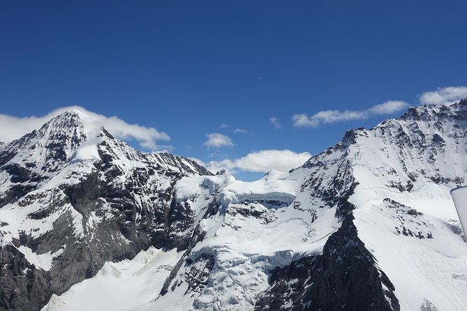 private-swiss-alps-helicopter-tour-over-snow-covered-mountain-peaks-and-glaciers