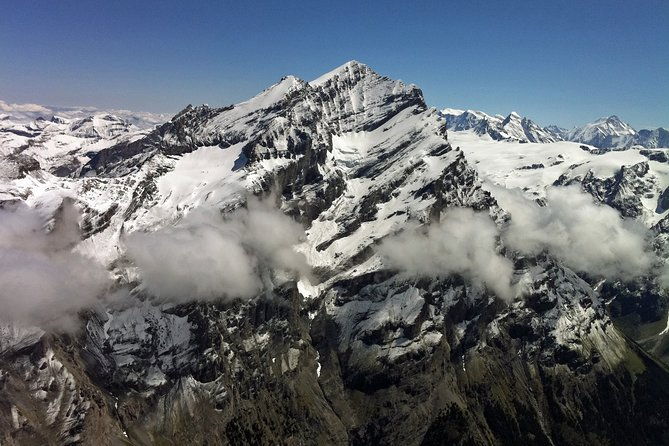 private-swiss-alps-helicopter-tour-over-snow-covered-mountain-peaks-and-glaciers