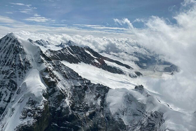 private-swiss-alps-helicopter-tour-over-snow-covered-mountain-peaks-and-glaciers