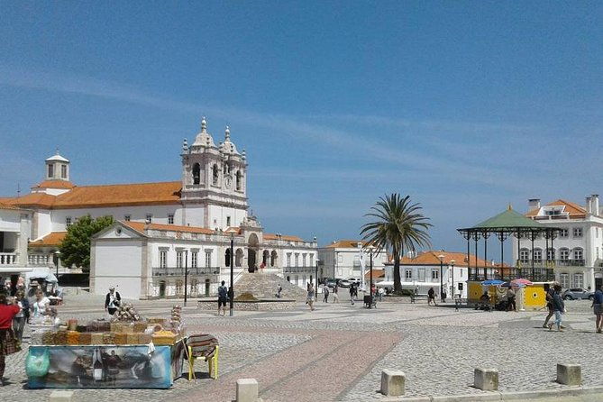 private-tour-highlights-fatima-sanctuary-nazare-big-waves-and-obidos-medieval