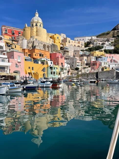 Procida: Complete boat tour of the island with swimming stops and snacks - Key Points