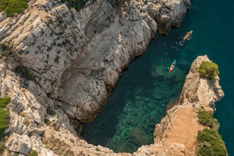 Pula: Cave and Islands Kayak Tour, Snorkeling and Drinks - Island Stops and Snorkeling