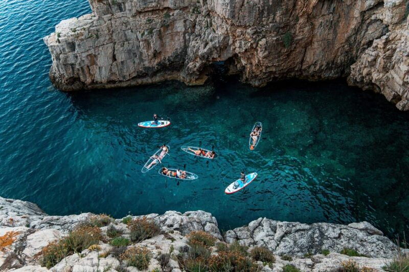 pula-sunset-night-illuminated-transparent-kayak-tour