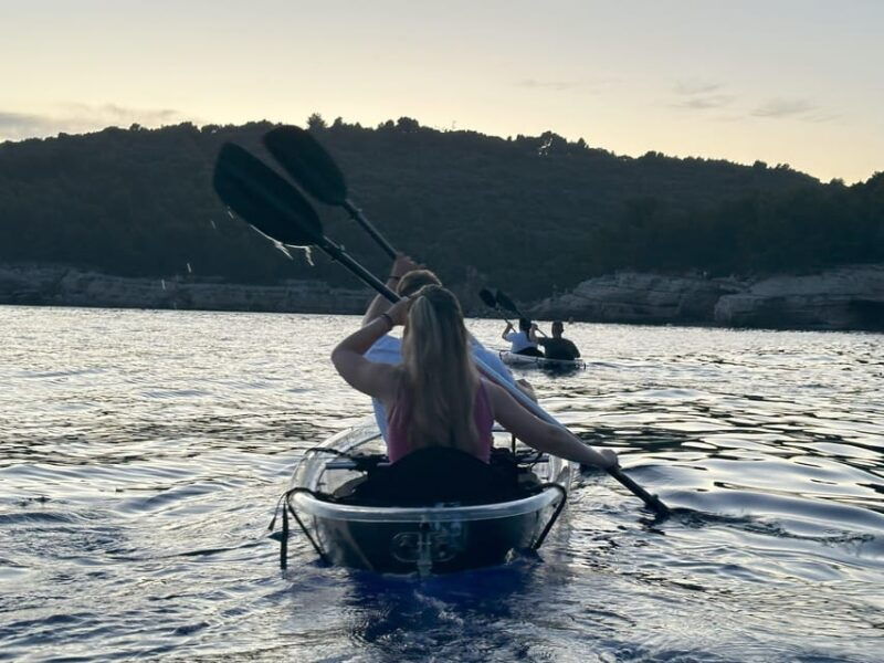 pula-sunset-night-illuminated-transparent-kayak-tour