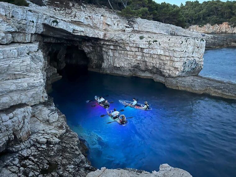 pula-sunset-night-illuminated-transparent-kayak-tour