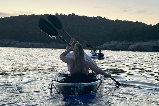 pula-sunset-night-time-illuminated-transparent-kayak-cave-tour