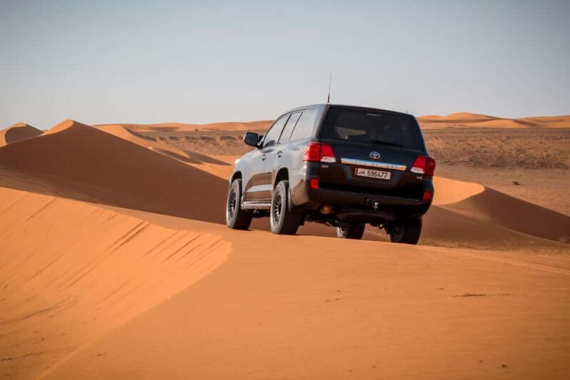 Qatar Desert Safari, Quad bike, Camel Ride and Sandboarding - The Guides and Personal Touches