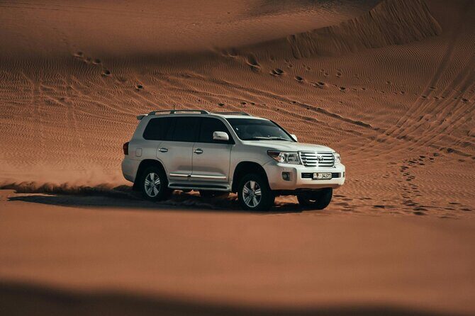 Quad Biking Dubai With Desert Safari Dune Bashing Camel Ride - A Full Breakdown of the Desert Adventure