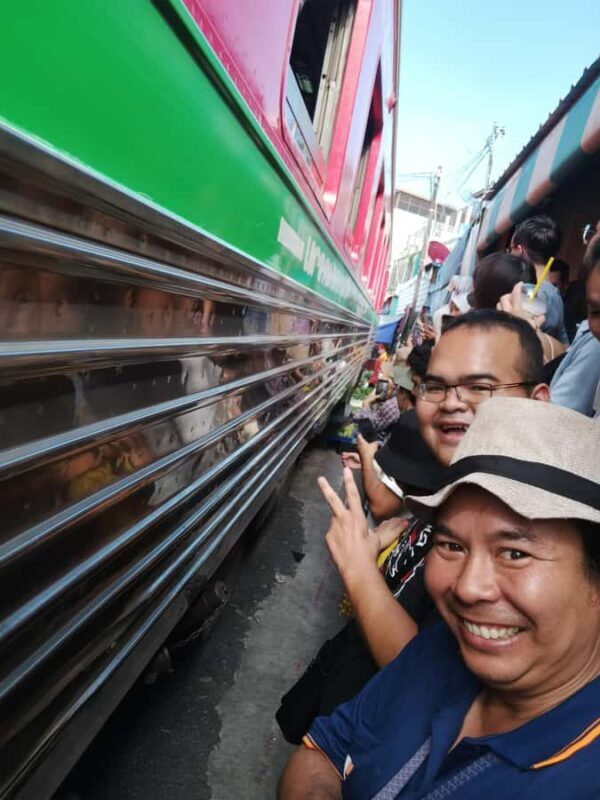 Railway to Waterway: Exploring Railway and Floating Market - Maeklong Railway Market: A Spectacle of Speed