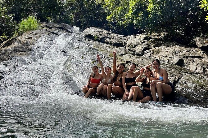 rainforest-waterfall-slide-and-rope-swing-with-adult-drinks