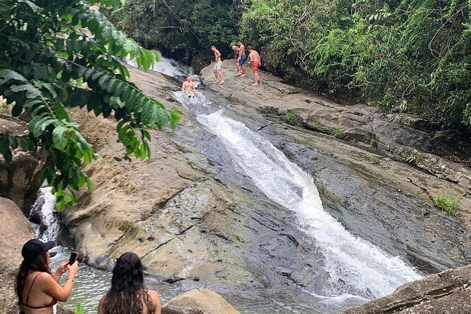 rainforest-waterfall-slide-and-rope-swing-with-adult-drinks