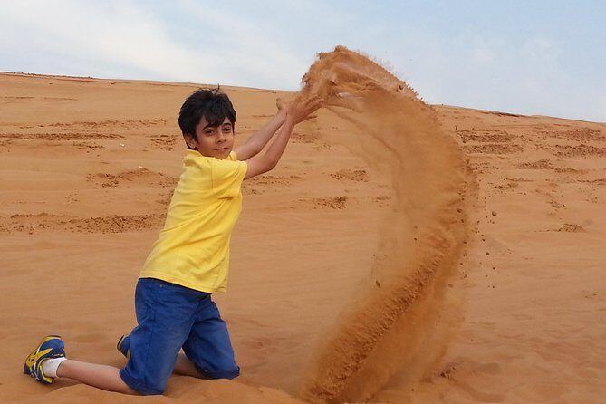 Red Dune Desert Safari & Quad Bike, BBQ Dinner. Camel Ride, Sandboarding - A Deep Dive Into the Desert Safari Experience
