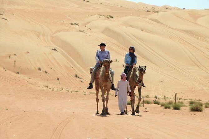 Red Dune Desert Safari with BBQ Dinner, Sand Boarding Dance Shows - Authentic Experiences: What Travelers Say